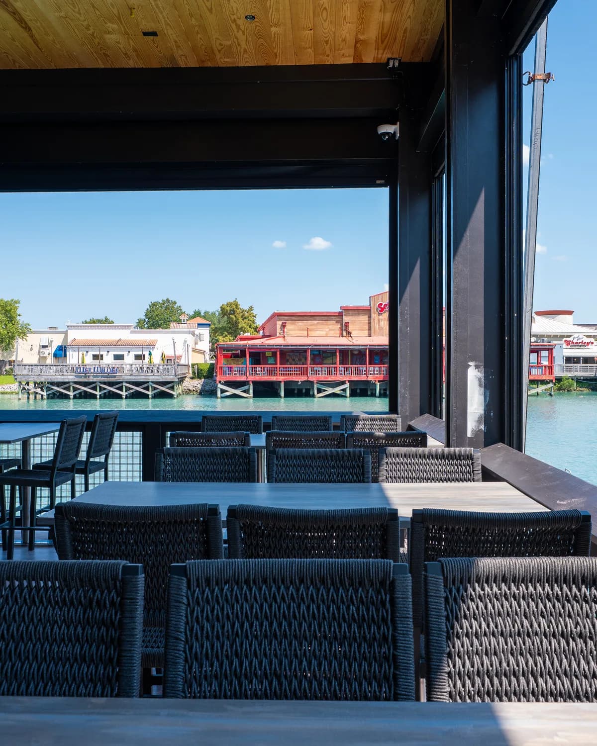 Seating on the Big Fish covered deck beside Lake Broadway